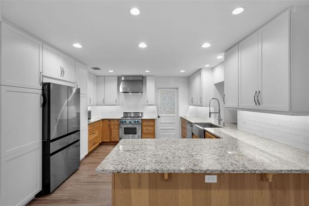 Interior, Kitchen, Recessed Lighting, Stainless Steel Appliances, Wood Texture Flooring