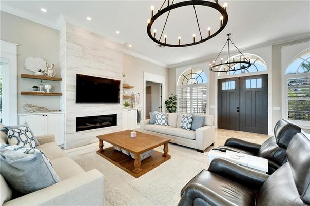 Chandelier, Fireplace, Interior, Living room, Recessed Lighting, Stone Walls