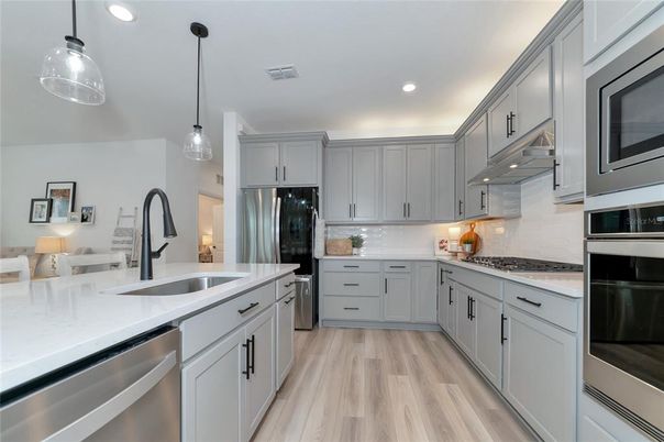 Interior, Kitchen, Pendant Lights, Recessed Lighting, Stainless Steel Appliances, Wood Texture Flooring