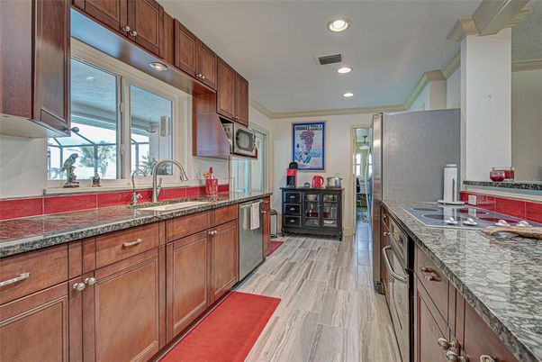Interior, Kitchen, Recessed Lighting, Stainless Steel Appliances, Wood Texture Flooring