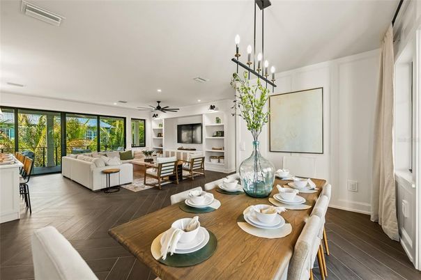 Dining room, Fireplace, Interior, Living room, Pendant Lights, Recessed Lighting, Wood Texture Flooring