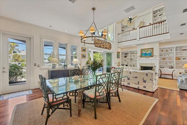 Chandelier, Dining room, Fireplace, Interior, Living room, Recessed Lighting, Wood Texture Flooring
