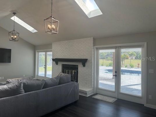 Fireplace, Interior, Living room, Pendant Lights, Stone Walls, Wood Texture Flooring