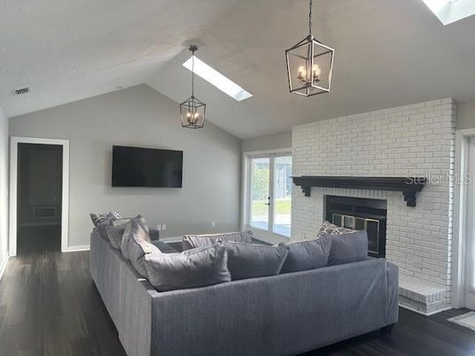 Fireplace, Interior, Living room, Pendant Lights, Stone Walls, Wood Texture Flooring