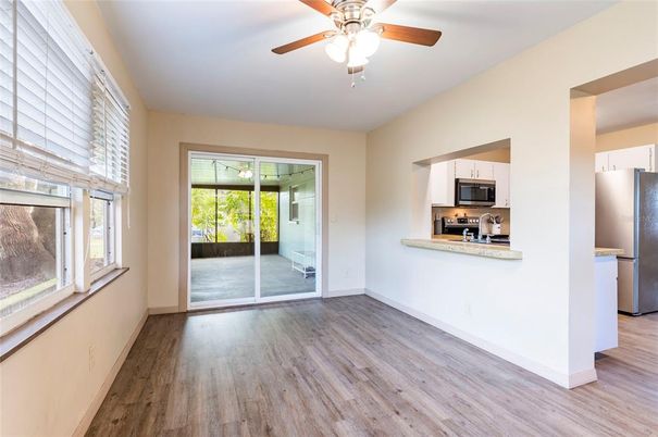 Empty room, Interior, Kitchen, Stainless Steel Appliances, Wood Texture Flooring
