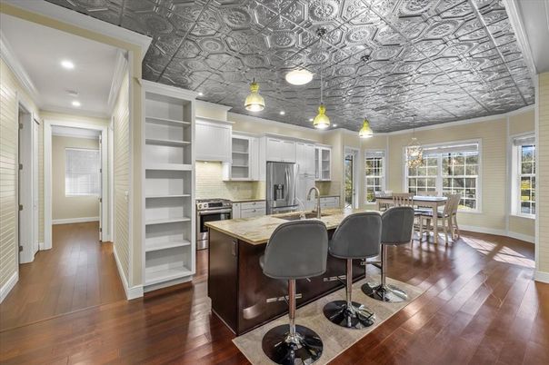 Dining room, Interior, Kitchen, Pendant Lights, Recessed Lighting, Stainless Steel Appliances, Wood Texture Flooring