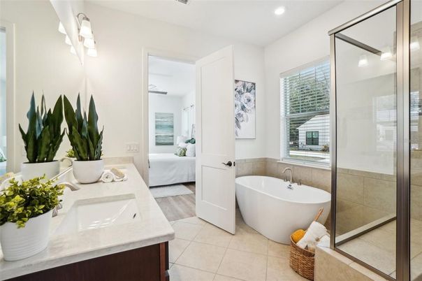 Bathroom, Bedroom, Dual Sink Vanities, Free Standing Baths, Glass Shower, Interior, Recessed Lighting, Wood Texture Flooring