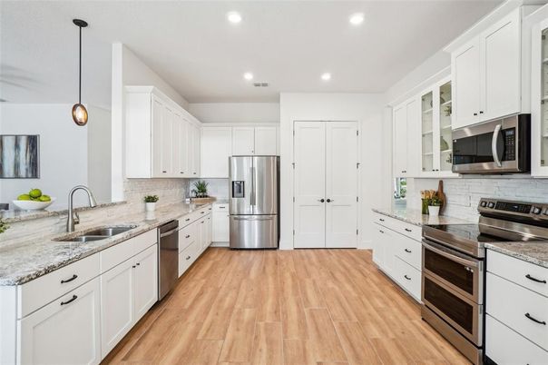 Interior, Kitchen, Pendant Lights, Recessed Lighting, Stainless Steel Appliances, Wood Texture Flooring