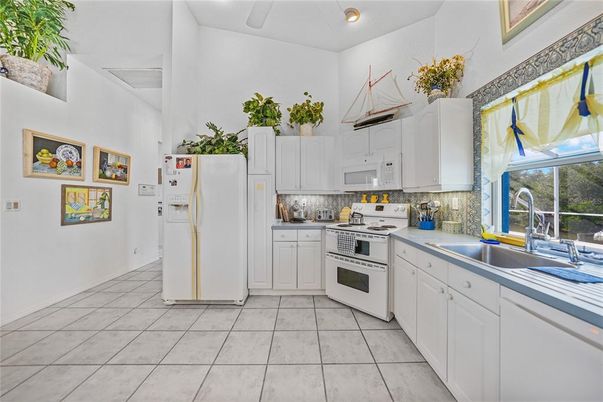 Interior, Kitchen, Recessed Lighting, Tile Countertops