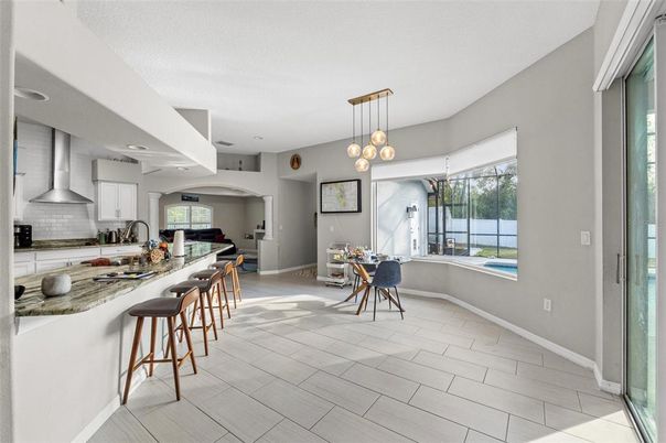 Dining room, Interior, Kitchen, Pendant Lights, Stainless Steel Appliances, Wood Texture Flooring
