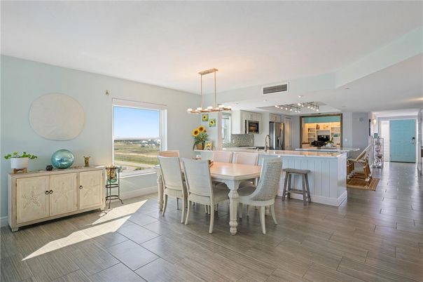 Dining room, Interior, Kitchen, Pendant Lights, Recessed Lighting, Stainless Steel Appliances, Wood Texture Flooring