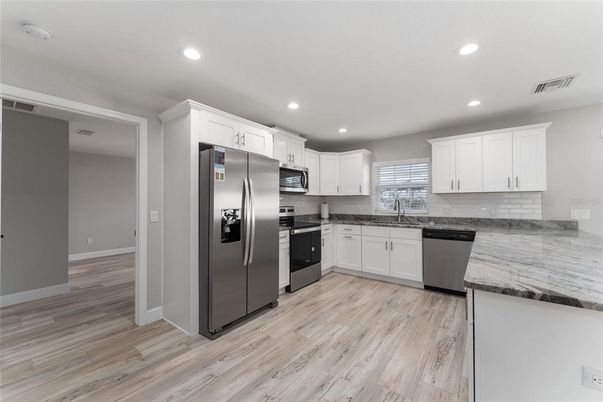 Interior, Kitchen, Recessed Lighting, Stainless Steel Appliances, Wood Texture Flooring