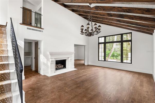 Chandelier, Empty room, Fireplace, Interior, Wooden Beams, Wood Texture Flooring