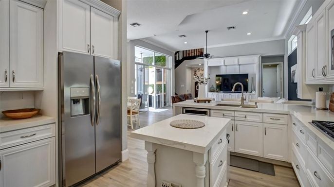 Dining room, Interior, Kitchen, Living room, Pendant Lights, Recessed Lighting, Stainless Steel Appliances, Wood Texture Flooring