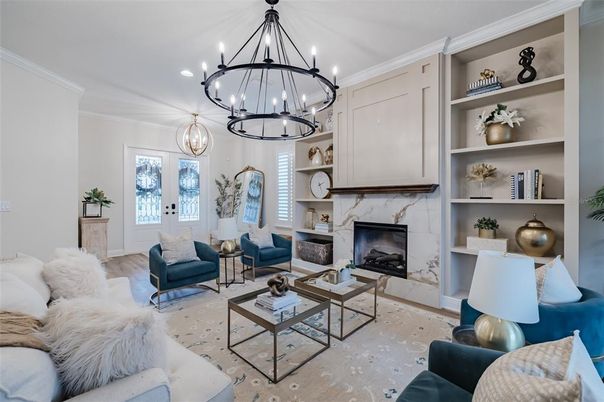 Chandelier, Fireplace, Interior, Living room, Pendant Lights, Recessed Lighting, Wood Texture Flooring