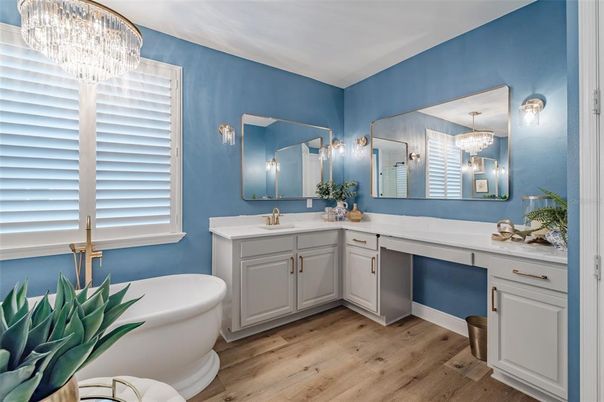 Bathroom, Chandelier, Dual Sink Vanities, Free Standing Baths, Interior, Wood Texture Flooring