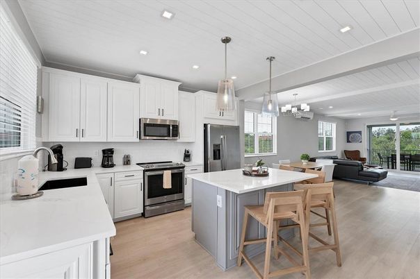 Dining room, Interior, Kitchen, Living room, Pendant Lights, Recessed Lighting, Stainless Steel Appliances, Wood Texture Flooring