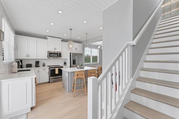 Interior, Kitchen, Pendant Lights, Recessed Lighting, Stainless Steel Appliances, Wood Texture Flooring