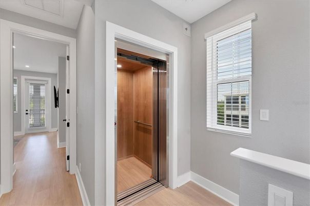 Elevator, Interior, Recessed Lighting, Wooden Ceilings, Wood Texture Flooring, Wooden Walls
