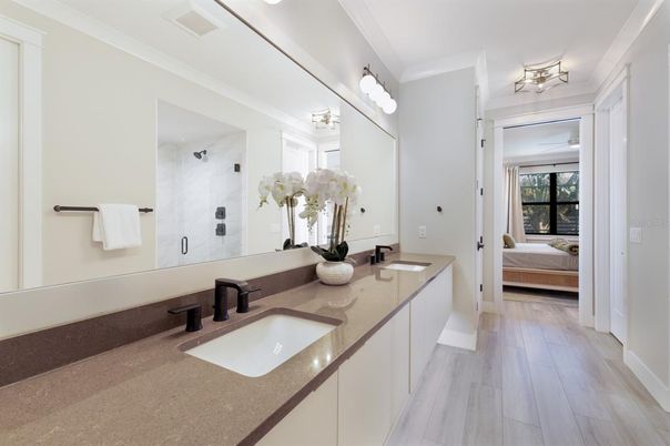 Bathroom, Bedroom, Dual Sink Vanities, Interior, Marble Walls, Wood Texture Flooring