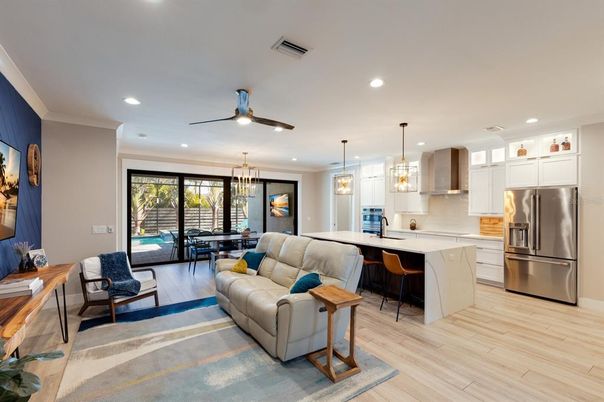 Dining room, Interior, Kitchen, Living room, Pendant Lights, Recessed Lighting, Stainless Steel Appliances, Wood Texture Flooring