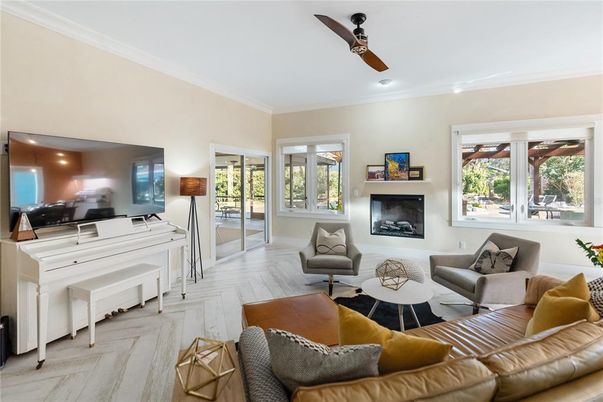 Fireplace, Interior, Living room, Piano, Recessed Lighting, Wood Texture Flooring