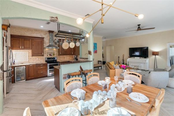 Dining room, Interior, Kitchen, Recessed Lighting, Stainless Steel Appliances, Wood Texture Flooring