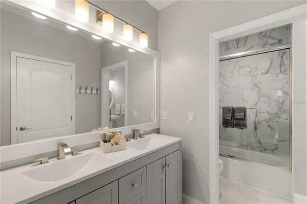 Bathroom, Dual Sink Vanities, Glass Shower, Interior, Marble Walls