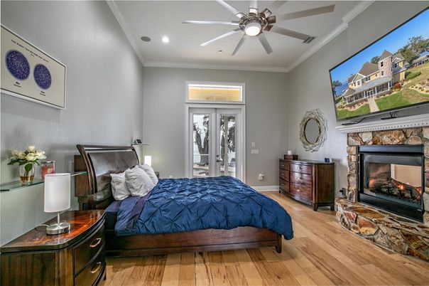 Bedroom, Fireplace, Interior, Recessed Lighting, Wood Texture Flooring