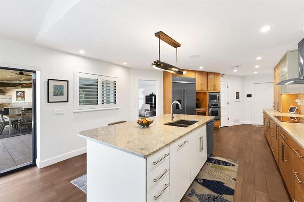 Interior, Kitchen, Pendant Lights, Recessed Lighting, Stainless Steel Appliances, Wood Texture Flooring