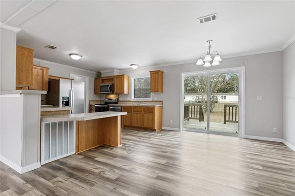 Chandelier, Interior, Kitchen, Stainless Steel Appliances, Wood Texture Flooring
