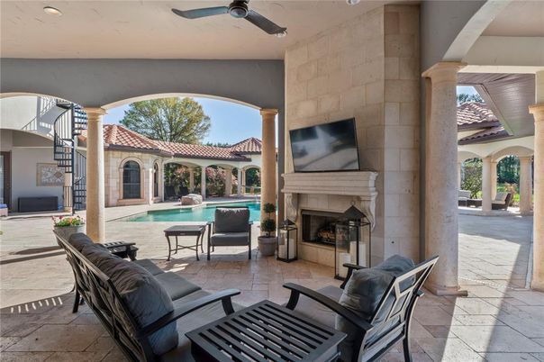 Exterior, Fireplace, Pool