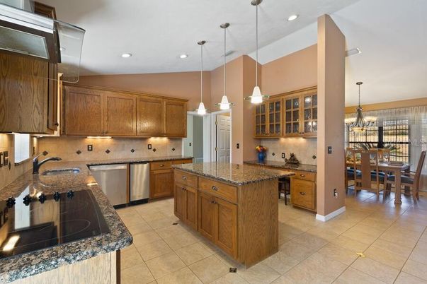 Chandelier, Dining room, Interior, Kitchen, Pendant Lights, Recessed Lighting, Stainless Steel Appliances