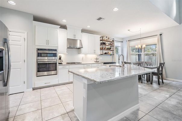 Chandelier, Dining room, Interior, Kitchen, Recessed Lighting, Stainless Steel Appliances