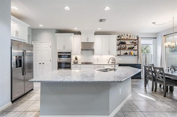 Chandelier, Dining room, Interior, Kitchen, Recessed Lighting, Stainless Steel Appliances