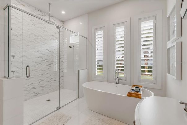 Bathroom, Free Standing Baths, Glass Shower, Interior, Marble Walls, Recessed Lighting