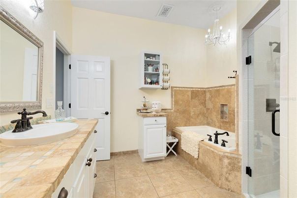 Bathroom, Chandelier, Glass Shower, Interior, Tile Countertops