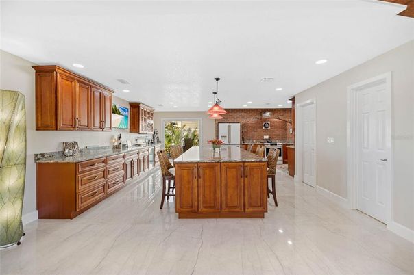 Dining room, Interior, Kitchen, Pendant Lights, Recessed Lighting, Stainless Steel Appliances, Stone Walls