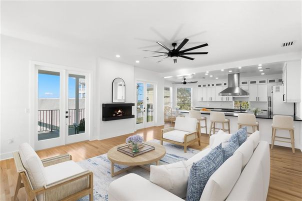 Fireplace, Interior, Kitchen, Living room, Recessed Lighting, Stainless Steel Appliances, Wood Texture Flooring