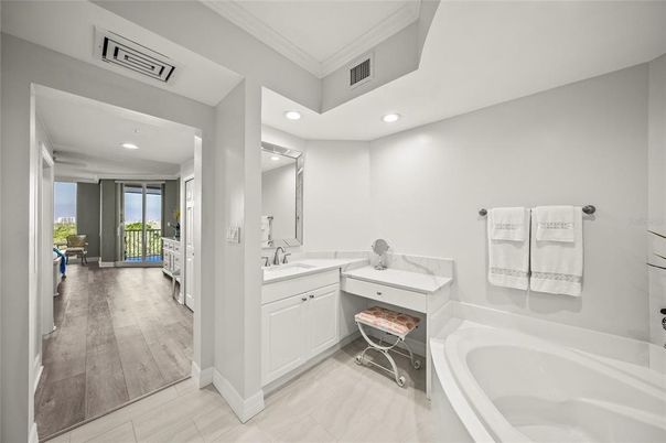 Bathroom, Dual Sink Vanities, Interior, Recessed Lighting, Wood Texture Flooring