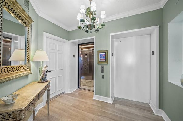 Chandelier, Elevator, Interior, Wood Texture Flooring