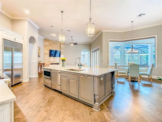 Dining room, Interior, Kitchen, Pendant Lights, Recessed Lighting, Stainless Steel Appliances, Wood Texture Flooring