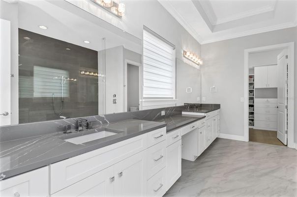 Bathroom, Dual Sink Vanities, Glass Shower, Interior, Marble, Recessed Lighting