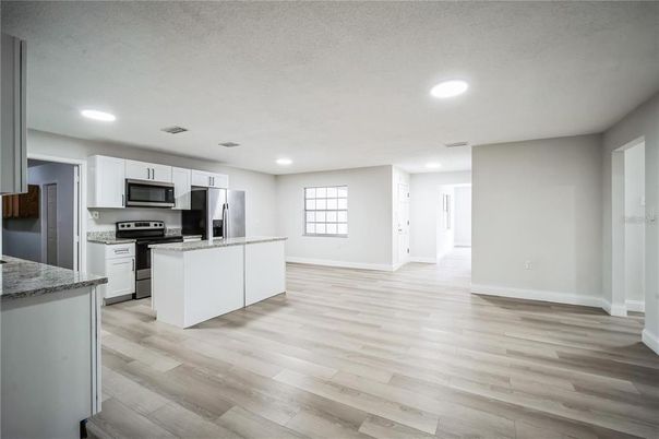 Interior, Kitchen, Recessed Lighting, Stainless Steel Appliances, Wood Texture Flooring