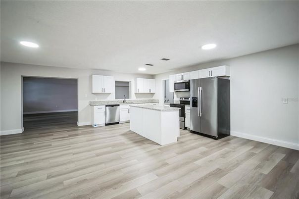 Interior, Kitchen, Recessed Lighting, Stainless Steel Appliances, Wood Texture Flooring