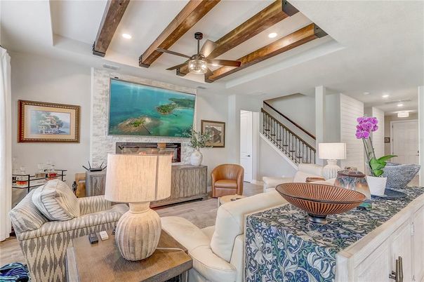 Chandelier, Dining room, Interior, Kitchen, Living room, Pendant Lights, Recessed Lighting, Stainless Steel Appliances, Wooden Beams, Wood Texture Flooring