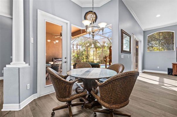 Chandelier, Dining room, Interior, Recessed Lighting, Sun Room, Wood Texture Flooring