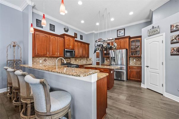 Interior, Kitchen, Pendant Lights, Recessed Lighting, Stainless Steel Appliances, Wood Texture Flooring