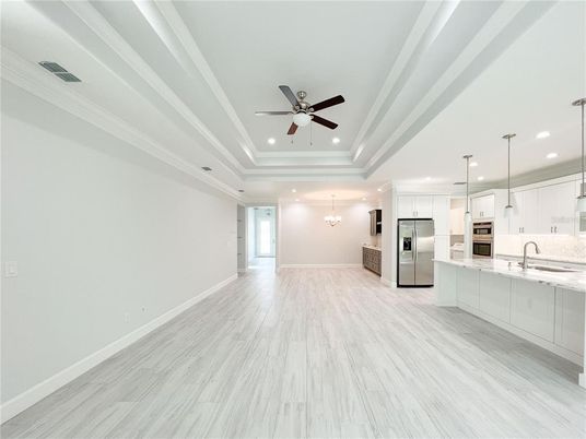Chandelier, Interior, Kitchen, Pendant Lights, Recessed Lighting, Stainless Steel Appliances, Wood Texture Flooring