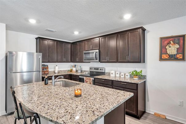 Interior, Kitchen, Recessed Lighting, Stainless Steel Appliances, Wood Texture Flooring